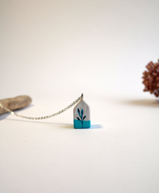 Къщата и синьото цвете